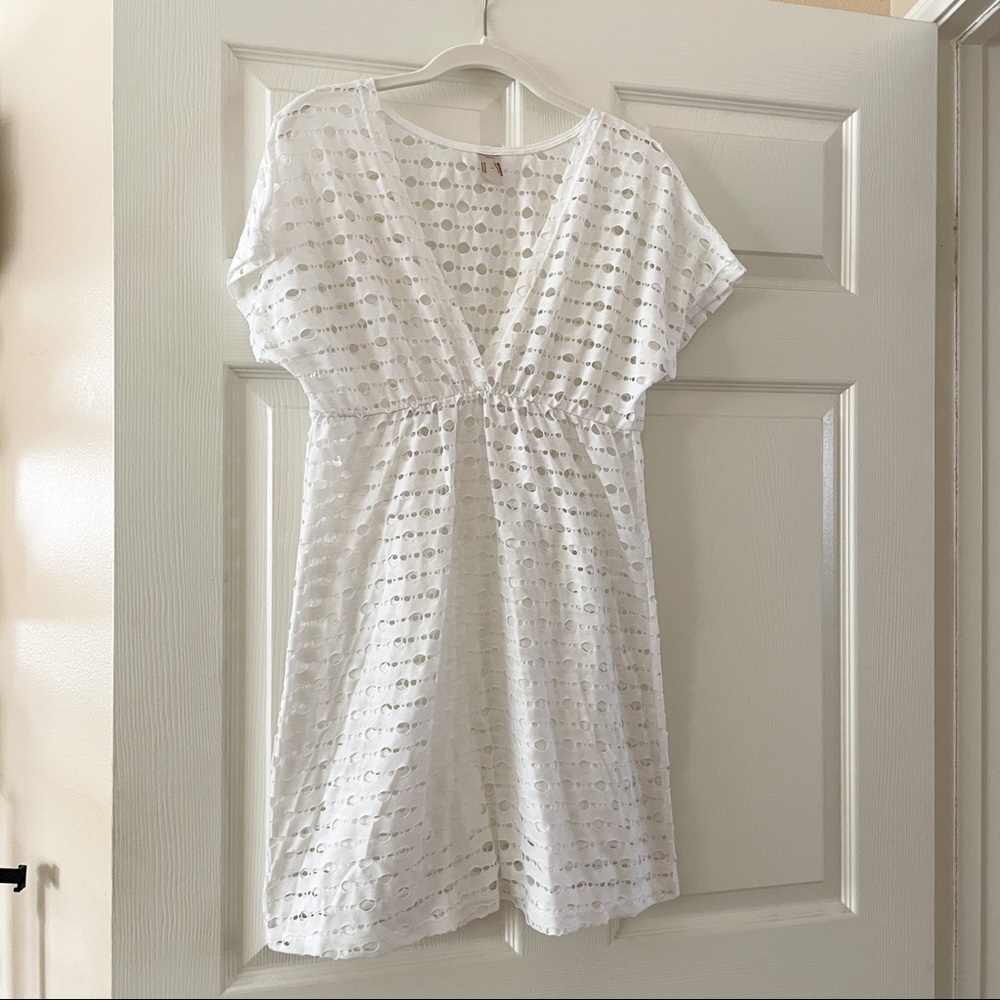 White Bathing suit cover up.